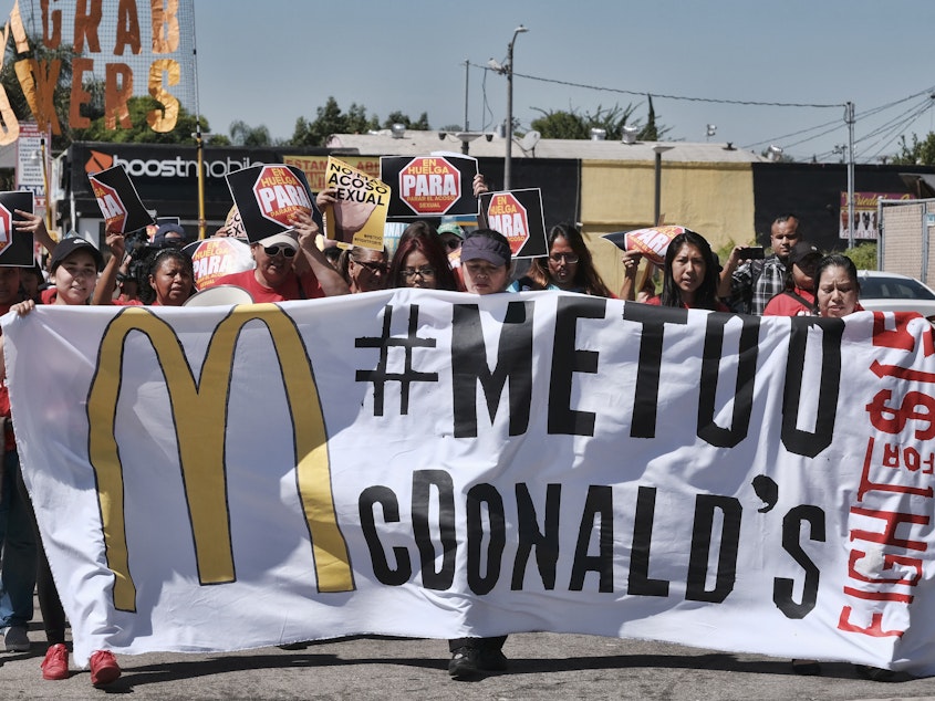 caption: McDonald's workers marching in Los Angeles in September 2018 as part of a multi-state strike seeking to combat sexual harassment in the workplace.