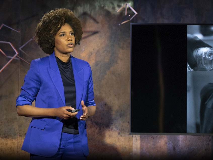 caption: LaToya Ruby Frazier speaks from the TED stage.