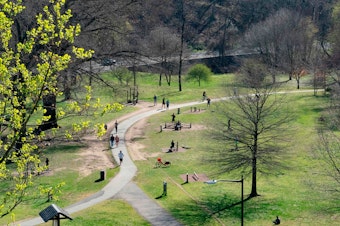 caption: People enjoy the Rock Creek Park in March in Washington, DC. While many Americans are following social distancing guidelines, others are not, and that worries people concerned about the spread of the coronavirus.