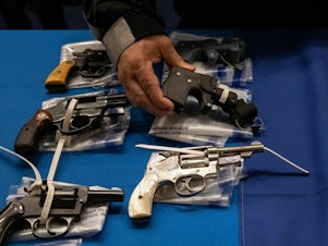caption: Ghost guns are unassembled and unmarked guns that can be bought online, and then assembled into fully operative guns. In August 2022, ATF issued regulations that required any such disassembled gun parts to carry serial numbers and required anyone buying them to pass a background check.