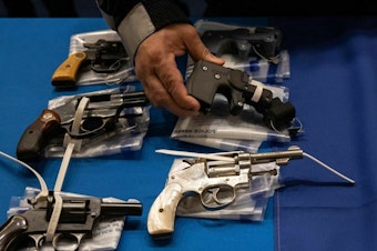 caption: Ghost guns are unassembled and unmarked guns that can be bought online, and then assembled into fully operative guns. In August 2022, ATF issued regulations that required any such disassembled gun parts to carry serial numbers and required anyone buying them to pass a background check.