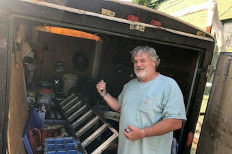 caption: Doug Layton, Jr. shows a trailer full of equipment he's acquired since being released from prison. He says he does painting and home repairs on the side, "trying to be productive in society."