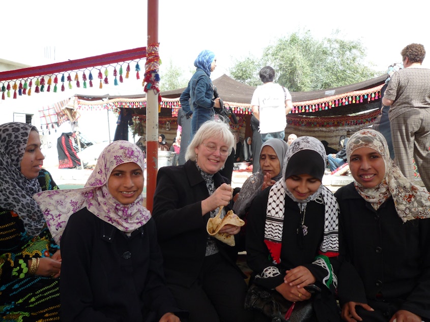 caption: Cindy Corrie, third from left, celebrates International Women's Day with friends in Gaza on March 8, 2009.
