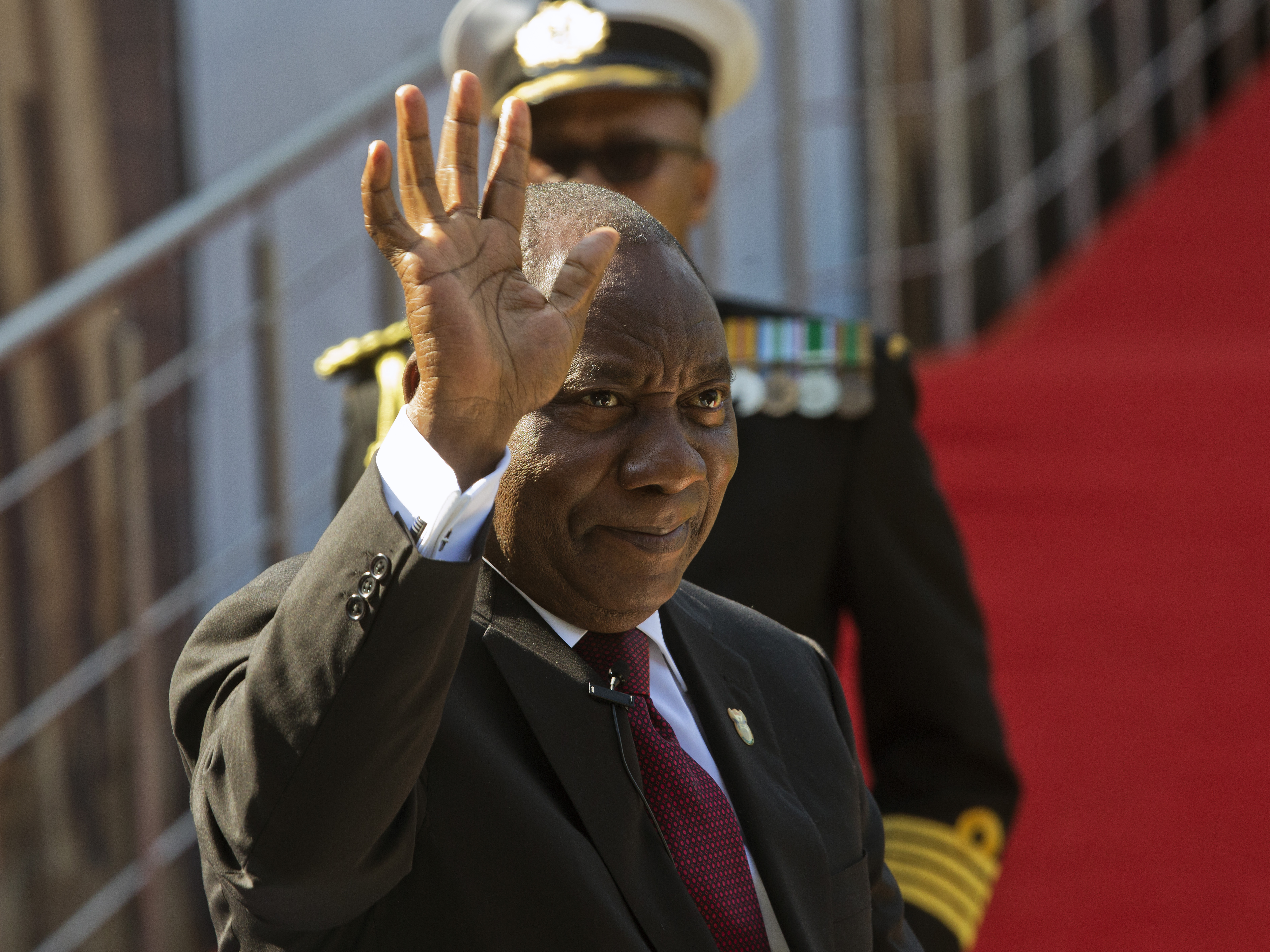 caption: South African President Cyril Ramaphosa arrives for his swearing-in ceremony in Pretoria, South Africa on Saturday. Ramaphosa signed a carbon tax into law on Sunday.