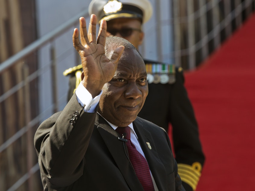 caption: South African President Cyril Ramaphosa arrives for his swearing-in ceremony in Pretoria, South Africa on Saturday. Ramaphosa signed a carbon tax into law on Sunday.