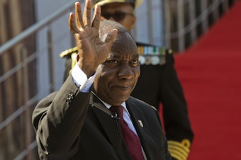 caption: South African President Cyril Ramaphosa arrives for his swearing-in ceremony in Pretoria, South Africa on Saturday. Ramaphosa signed a carbon tax into law on Sunday.