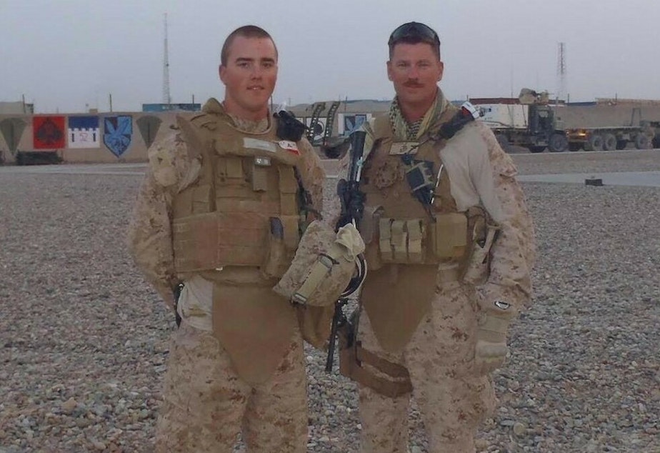 caption: Cole Lyle (left), a Marine Corps veteran and executive director of the veterans advocacy group Mission Roll Call, says a U.S. default would have devastating consequences for former military members who stand to see their benefits suspended.