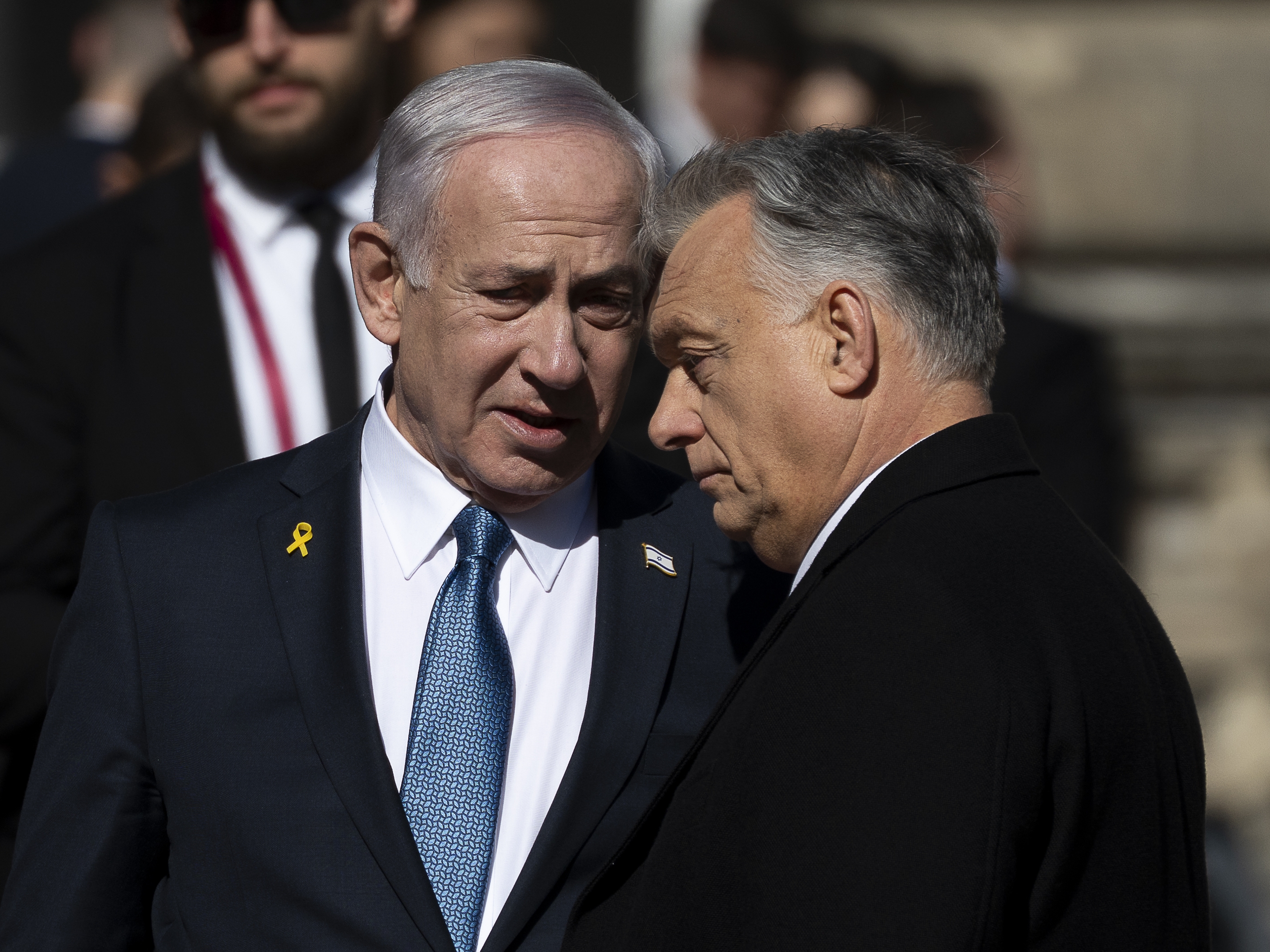 caption: Israeli Prime Minister Benjamin Netanyahu, left, and Hungarian Prime Minister Viktor Orban, right, talk after a welcoming ceremony with a guard of honor at Buda Castle in Budapest, Hungary, on Thursday.