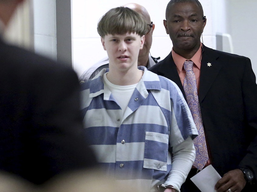 caption: Dylann Roof enters the court room at the Charleston County Judicial Center to enter his guilty plea on murder charges on April 10, 2017, in Charleston, S.C. The Supreme Court has rejected an appeal from Roof, who challenged his death sentence and conviction in the 2015 racist slayings of nine members of a Black South Carolina congregation.
