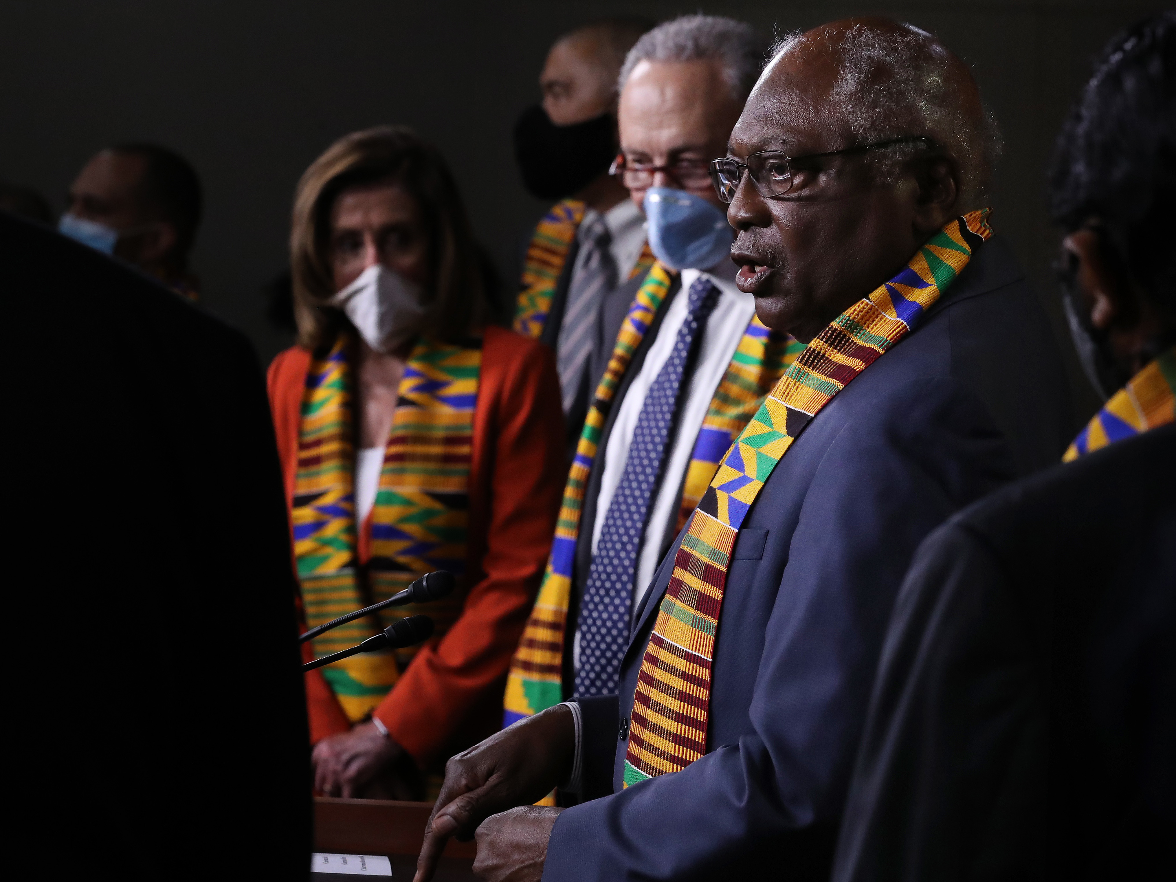 caption: House Majority Whip James Clyburn (right) joins fellow Democrats from the House and Senate to propose new legislation to end excessive use of force by police.