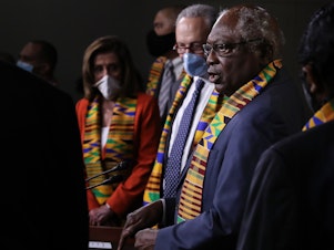caption: House Majority Whip James Clyburn (right) joins fellow Democrats from the House and Senate to propose new legislation to end excessive use of force by police.
