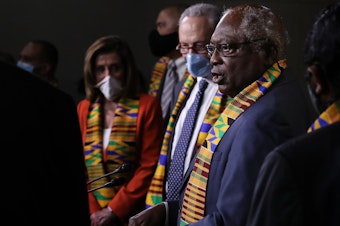 caption: House Majority Whip James Clyburn (right) joins fellow Democrats from the House and Senate to propose new legislation to end excessive use of force by police.