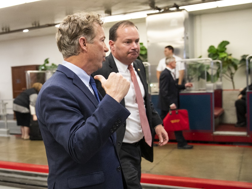 caption: Republicans Sen. Mike Lee of Utah (right) and Sen. Rand Paul of Kentucky talk following a Jan. 9 classified briefing on last week's targeted killing of Iran's senior military commander Gen. Qassem Soleimani.