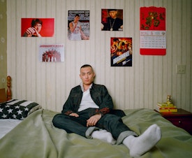 caption: Portrait from Brooklyn-based photographer Andrew Kung's series The All-American. Kung says this series aims to examine masculinity and what it means to be American within the context the stereotype of the desexualized Asian man. 