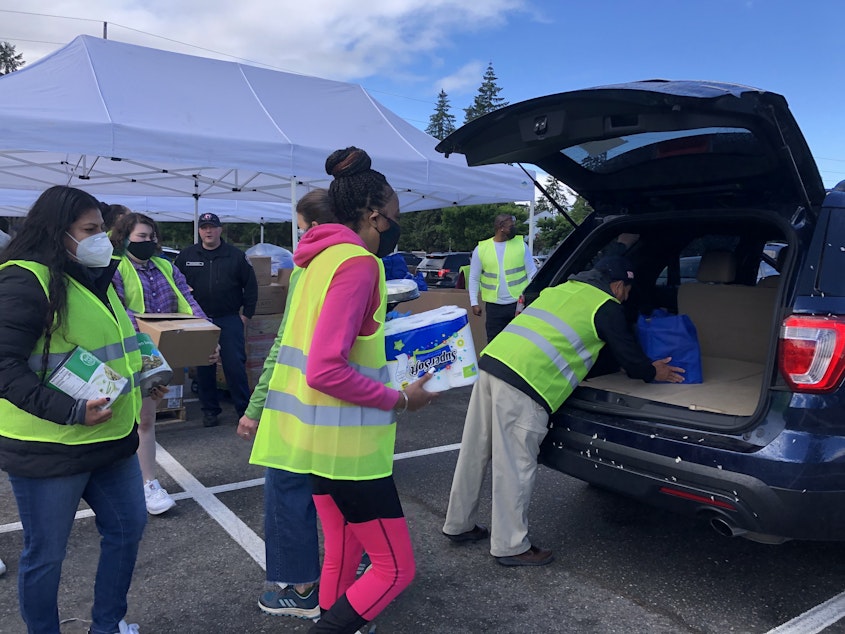 caption: More than 600 military families came to a food distribution event in Lakewood, Tacoma in June 2021.