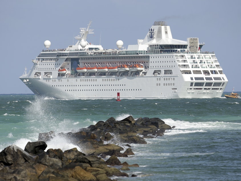 caption: After bad weather forced it to reroute, the Royal Caribbean cruise ship Empress of the Seas rescued two stranded fishermen last week between Grand Cayman and Jamaica.
