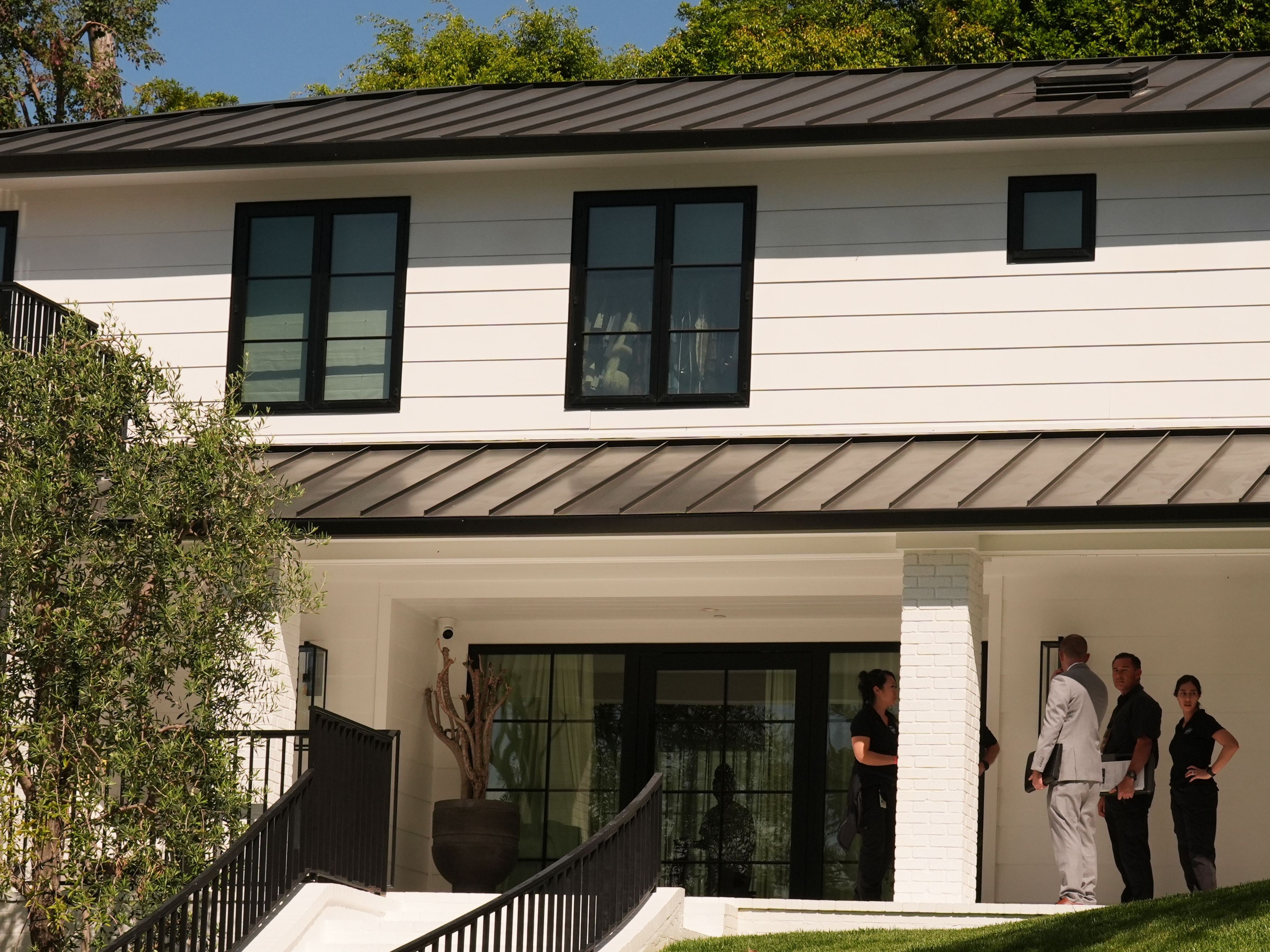 caption: The exterior of Rihanna's residence is shown Monday, March 9, 2026, in Beverly Hills, California.