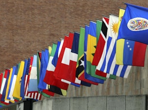 caption: The flags of the Organization of American States (OAS)