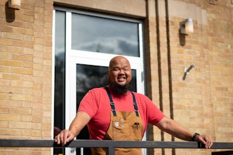 caption: Chef Yia Vang's restaurant in Minneapolis is getting ready to open amid a fierce debate within the restaurant industry about the minimum wage. The restaurant will not have tipping.