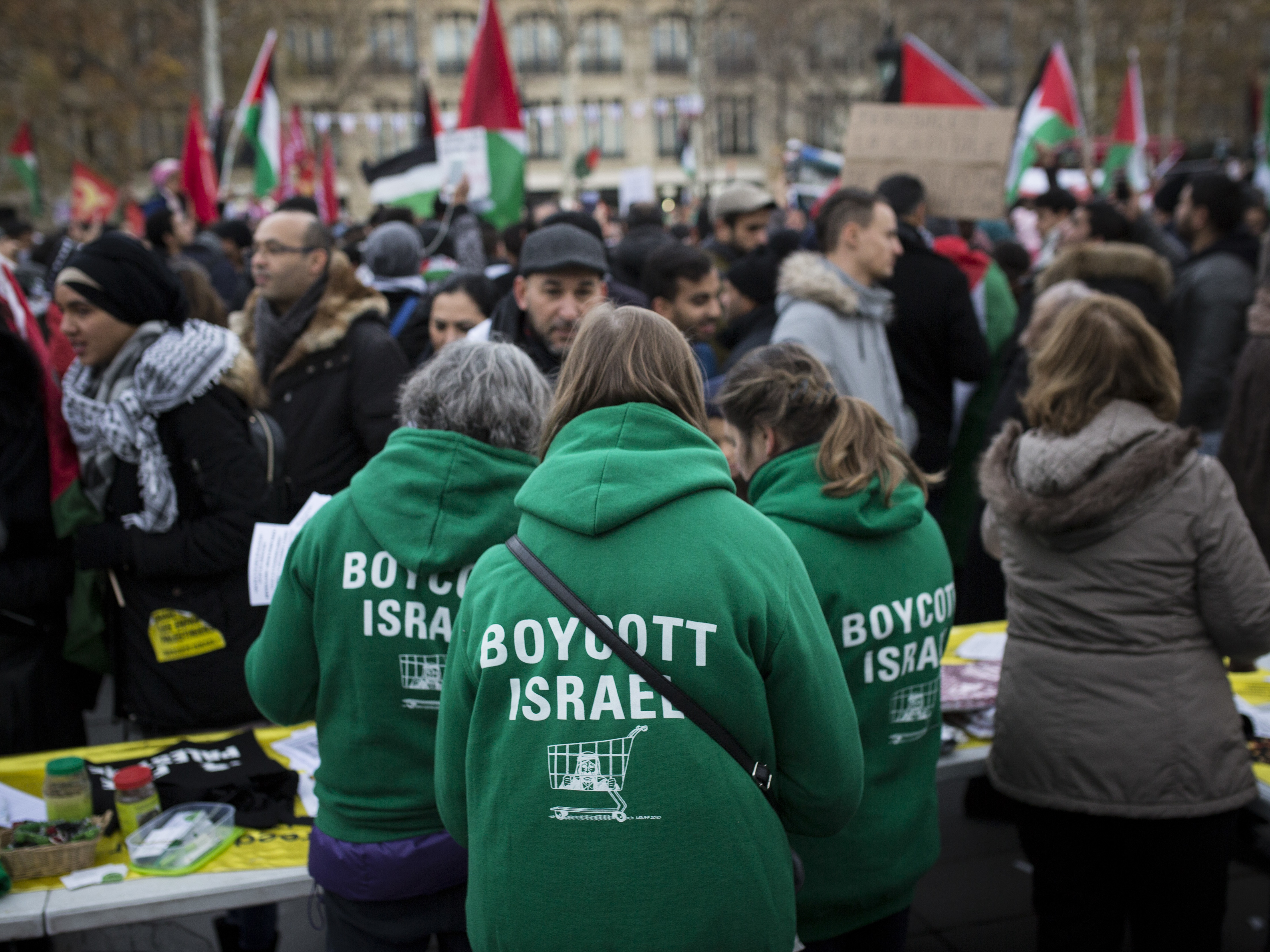caption: Demonstrators advocating the movement to boycott, divest from and sanction Israel, known as BDS, gather for a protest last year in Paris. On Thursday, U.S. Secretary of State Mike Pompeo announced a new policy specifically countering the global BDS campaign.