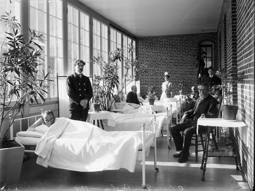 The porches of the 1890s Allison Buildings, shown above in 1910, were later enclosed to provide more space for patient beds.