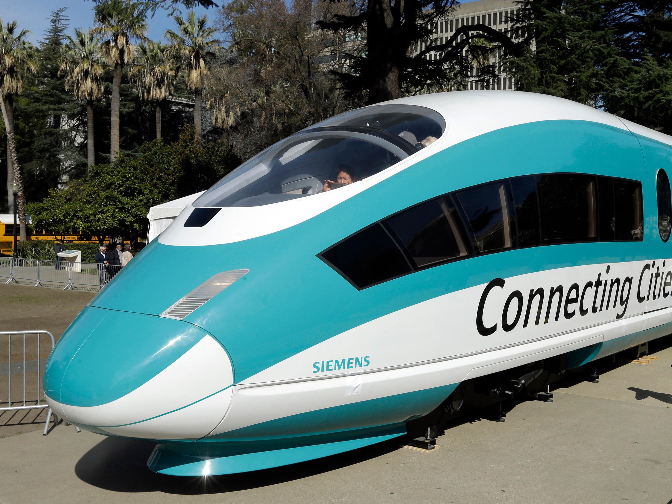 caption: A full-scale mock-up of a high-speed train is on display at the Capitol in Sacramento, Calif., in 2015. The Trump administration is planning to cancel a $929 million federal grant for the project.