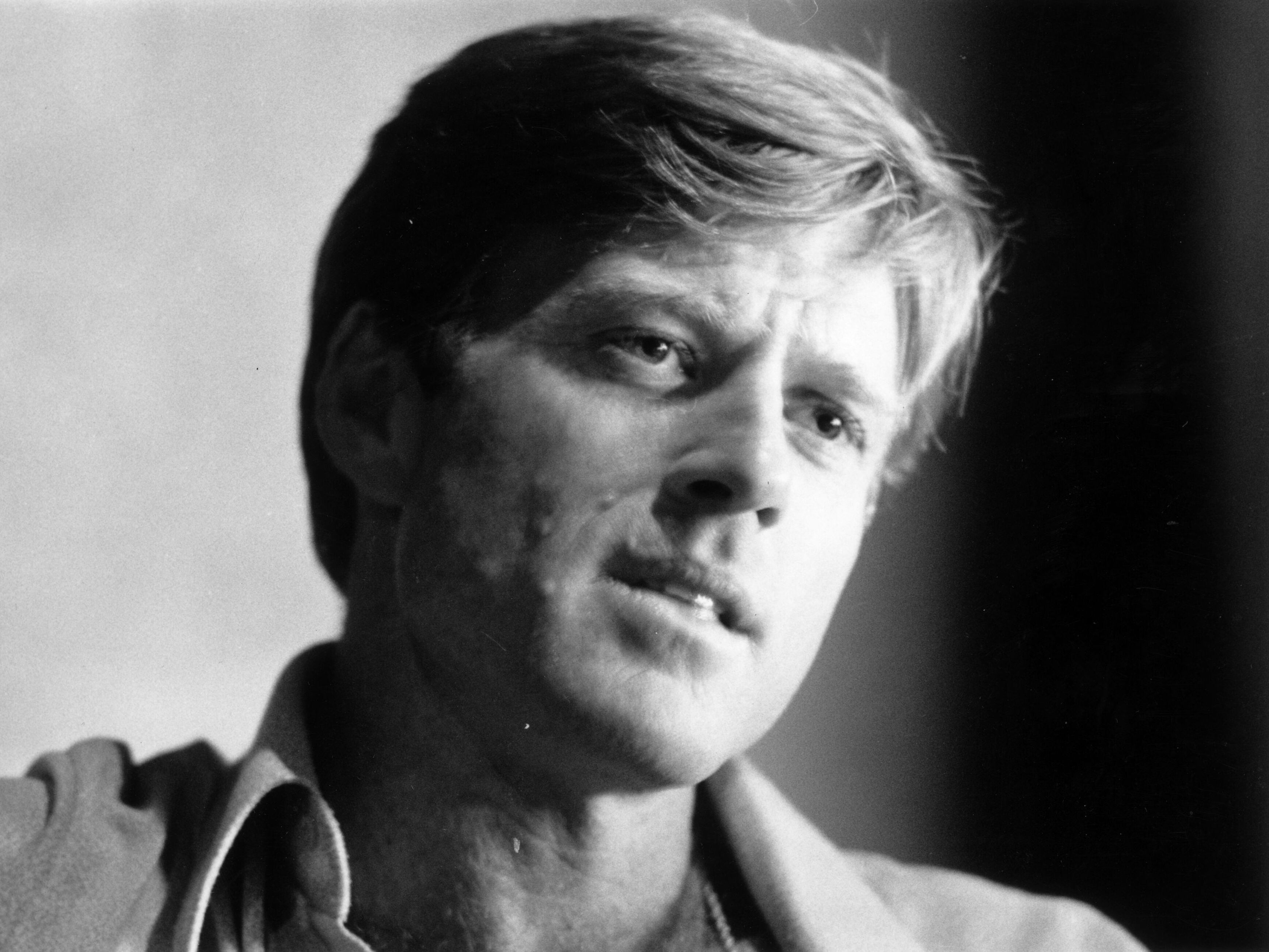 caption: Robert Redford speaks at a National Film Theatre lecture in London in 1973, during filming of <em>The Great Gatsby</em>.