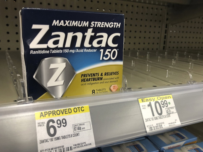caption: A box of Zantac tablets sits at a pharmacy in Miami Beach, Fla. On Wednesday, U.S. health regulators ordered that the popular heartburn drug be pulled from the market.