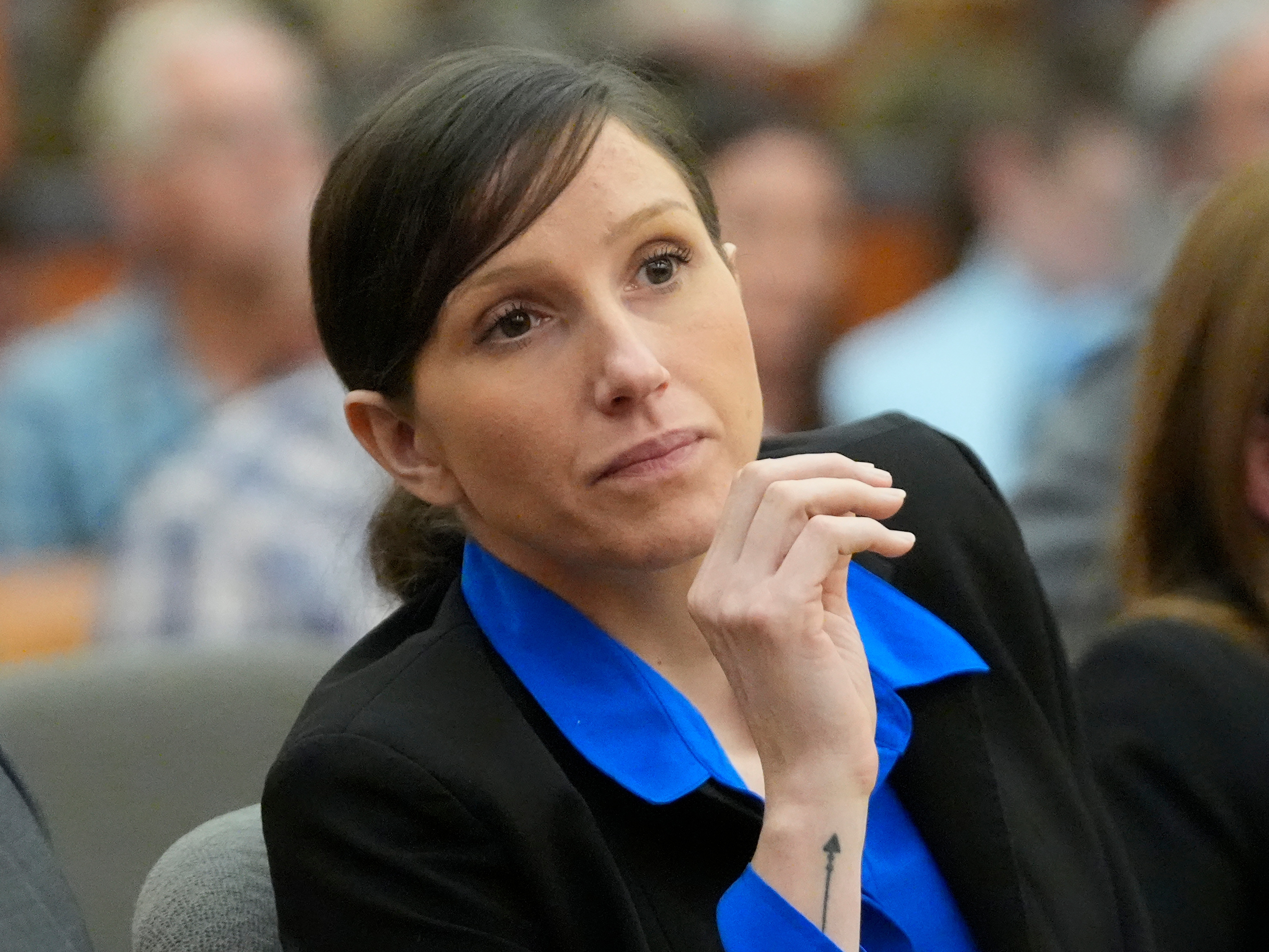 caption: Kouri Richins, pictured during an August 2024 court hearing, was found guilty of the aggravated murder of her husband and four other charges, including forgery and fraud.