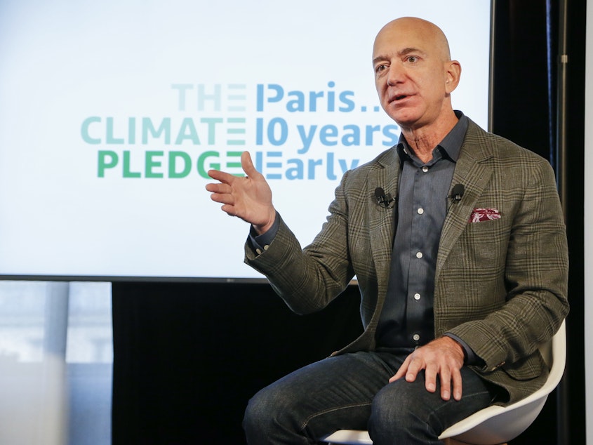 caption: Amazon CEO Jeff Bezos announces the company's climate initiative Thursday at the National Press Club in Washington, D.C.
