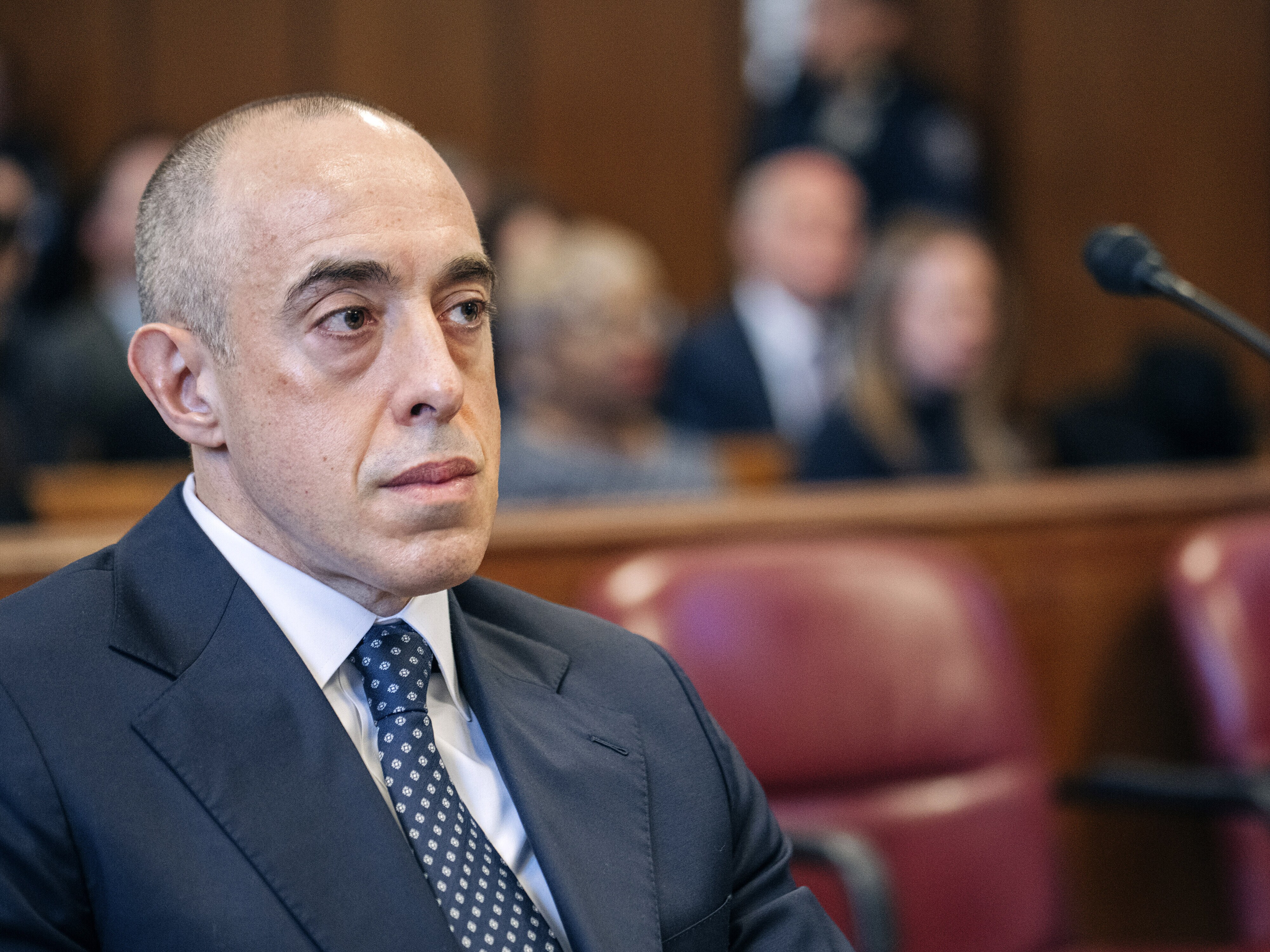 caption: Emil Boveis shown sitting in a Manhattan criminal court during Donald Trump's sentencing in the hush money case in New York, Jan. 10, 2025.