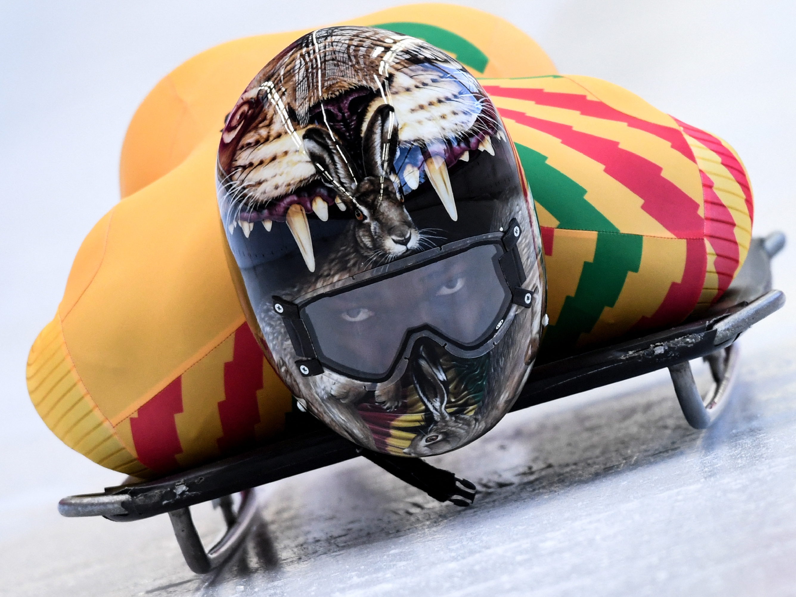 caption: Ghana's Akwasi Frimpong takes part in a training session for the men's skeleton event in the 2018 Olympics.