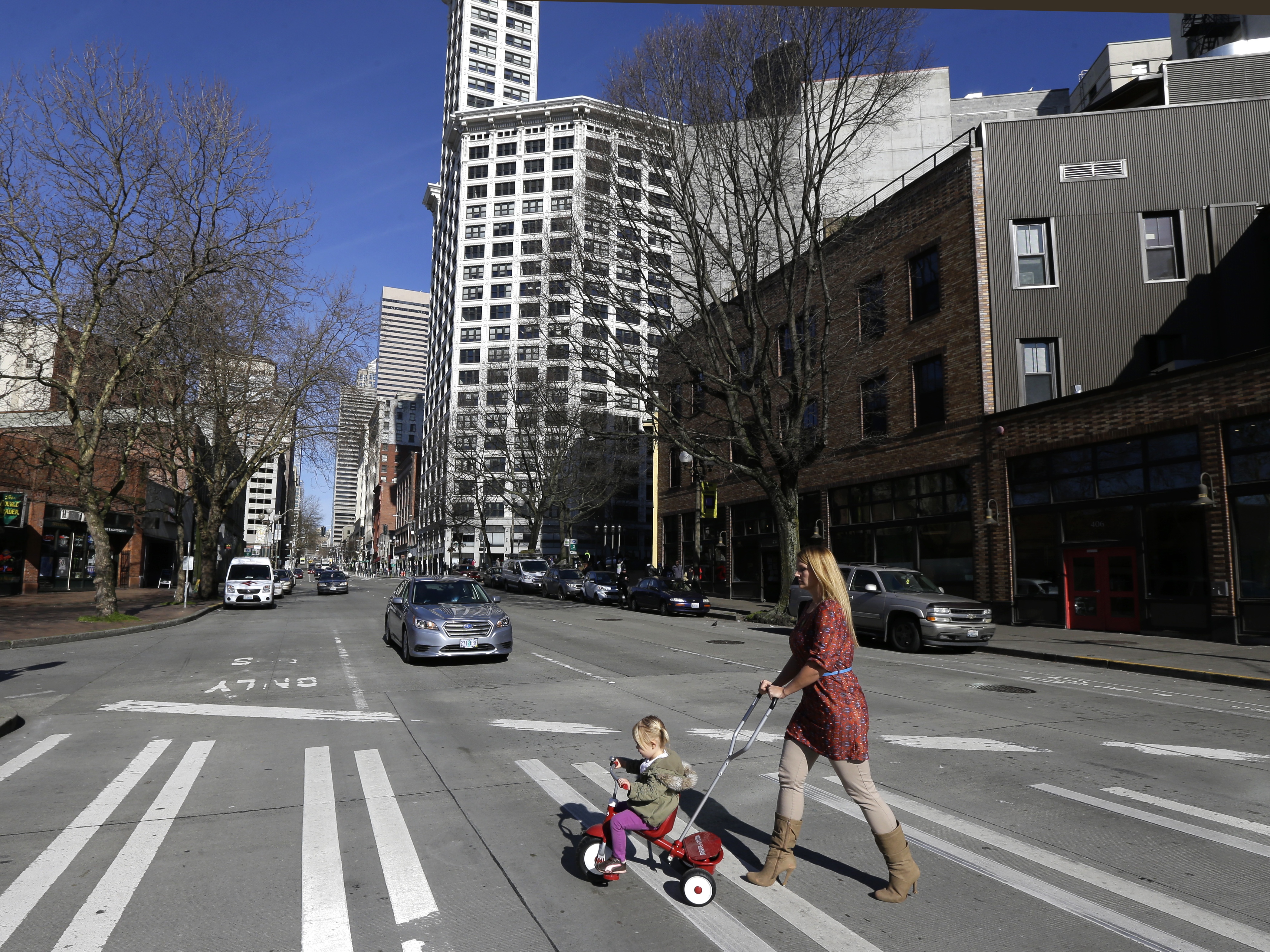 caption: It's becoming safer to cross the street. Pedestrian deaths fell by 5.4% in 2023, marking the first decline since the start of the COVID-19 pandemic.