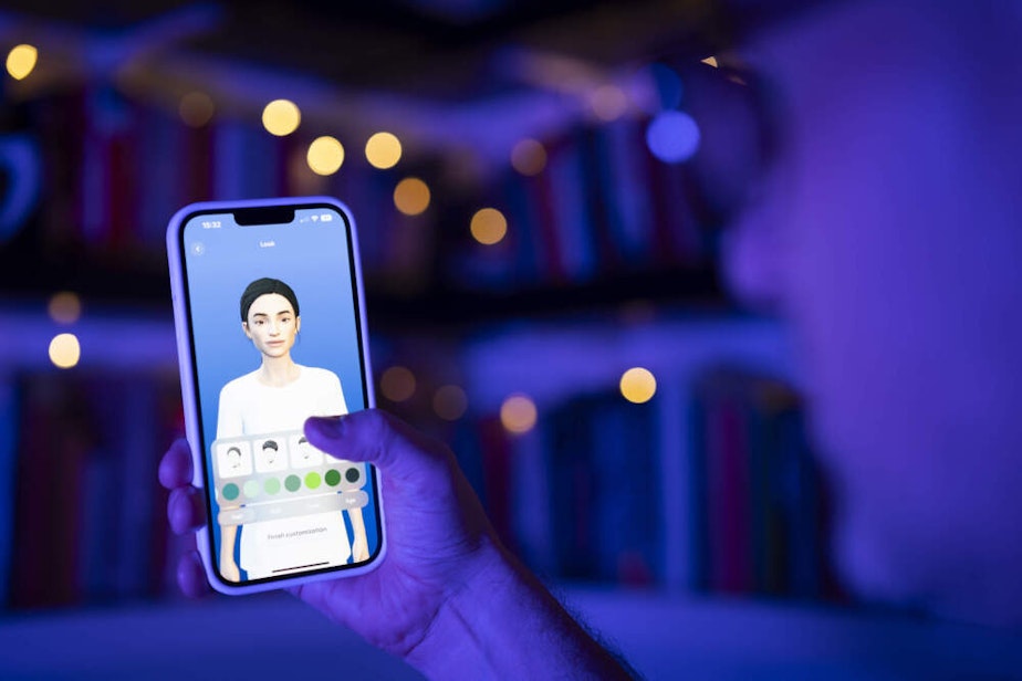 caption: This illustration photo shows a user interacting with a smartphone app to customize an avatar for a personal artificial intelligence chatbot, known as a Replika. (Jaap Arriens/NurPhoto via Getty Images)