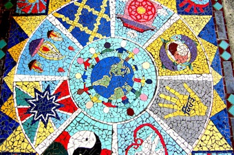 caption: A sidewalk mosaic in Vancouver's famed Punjabi Market.