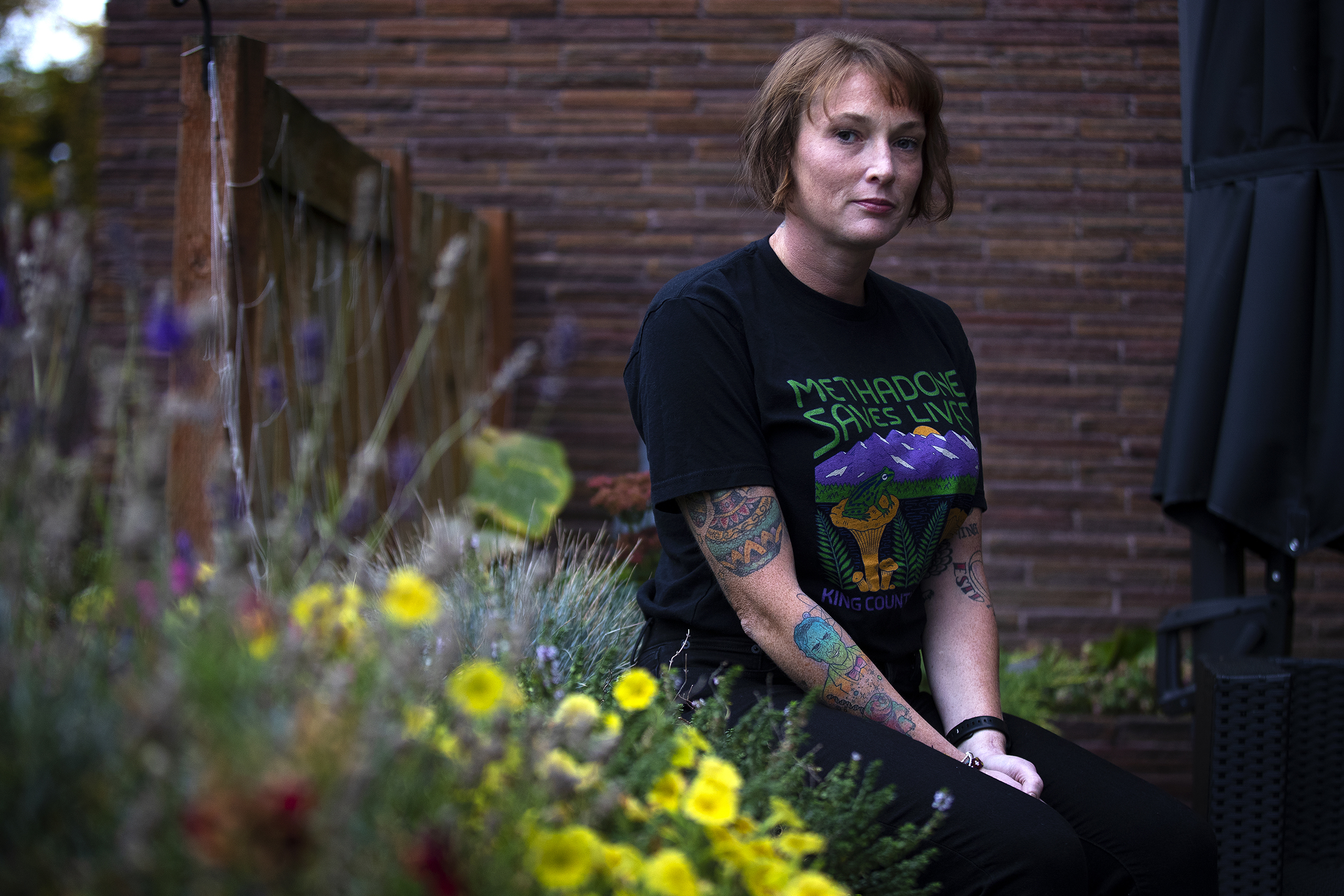 caption: Cody Nagle is portrayed on Tuesday, Oct. 15, 2024, on the balcony of her mother’s apartment, in Seattle’s Queen Anne neighborhood. 