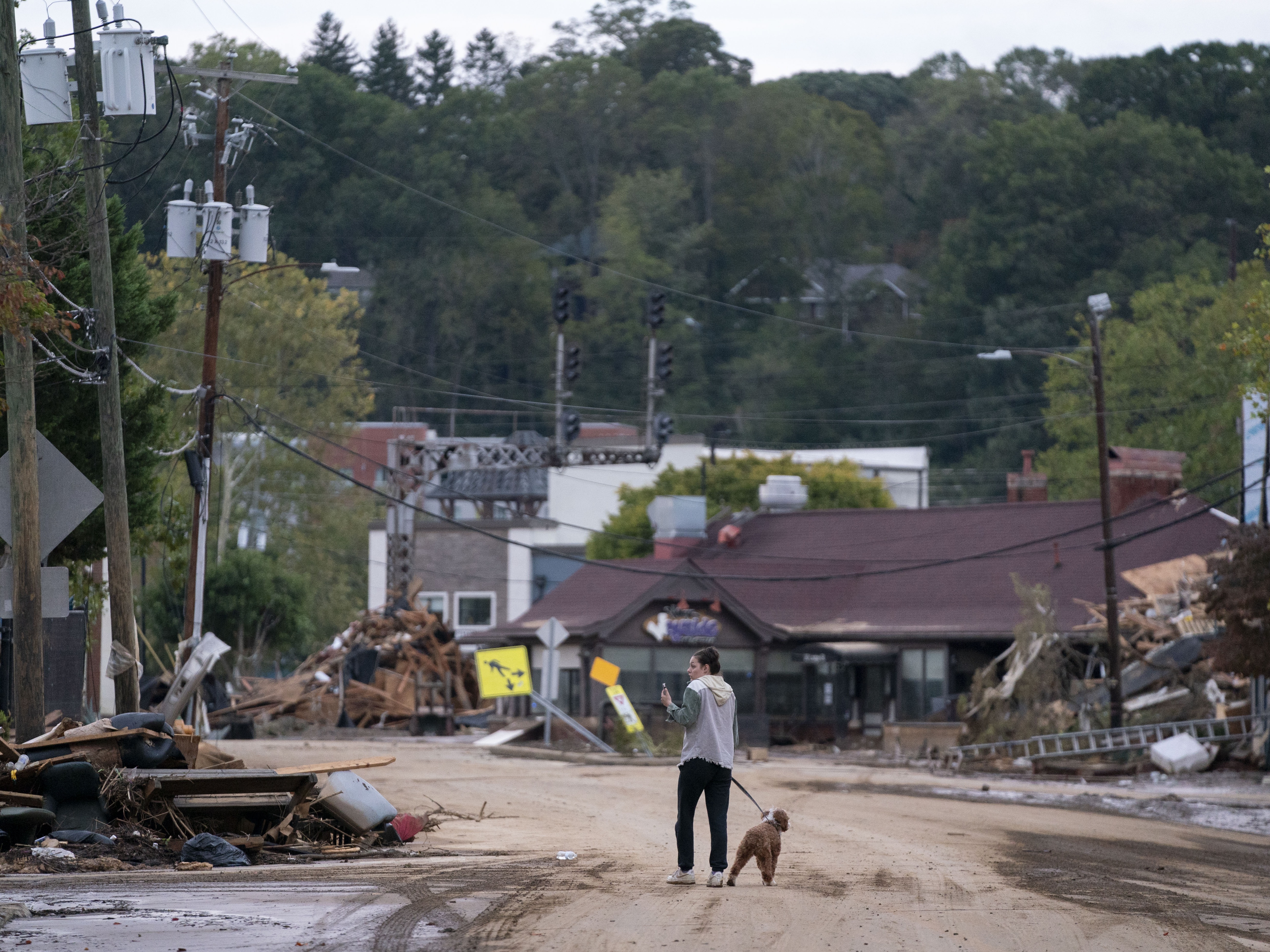 caption: Asheville, North Carolina was billed as a "climate haven." Now it's seeing widespread destruction from Hurricane Helene.