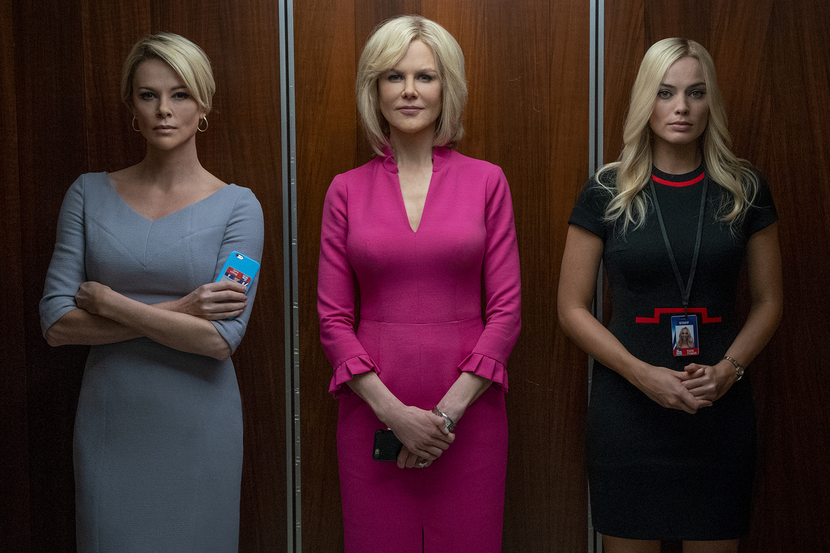 caption: Charlize Theron (left) as Megyn Kelly, Nicole Kidman (center) as Gretchen Carlson and Margot Robbie as fictional Fox News producer Kayla Pospisil in "Bombshell." (Hilary Bronwyn Gayle SMPSP)