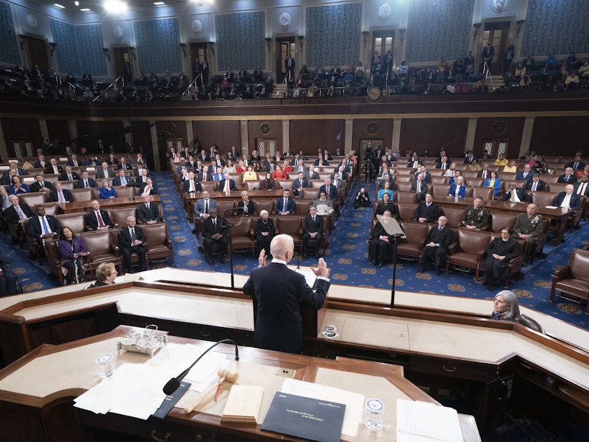 caption: President Biden delivers the State of the Union address before a joint session of Congress at the U.S. Capitol on Tuesday.