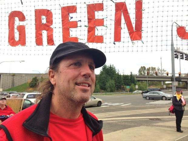 caption: Carlo Voli quit his corporate job a few years ago to become a full time Community Supported Activist. He's been fighting fossil fuels and climate change ever since.