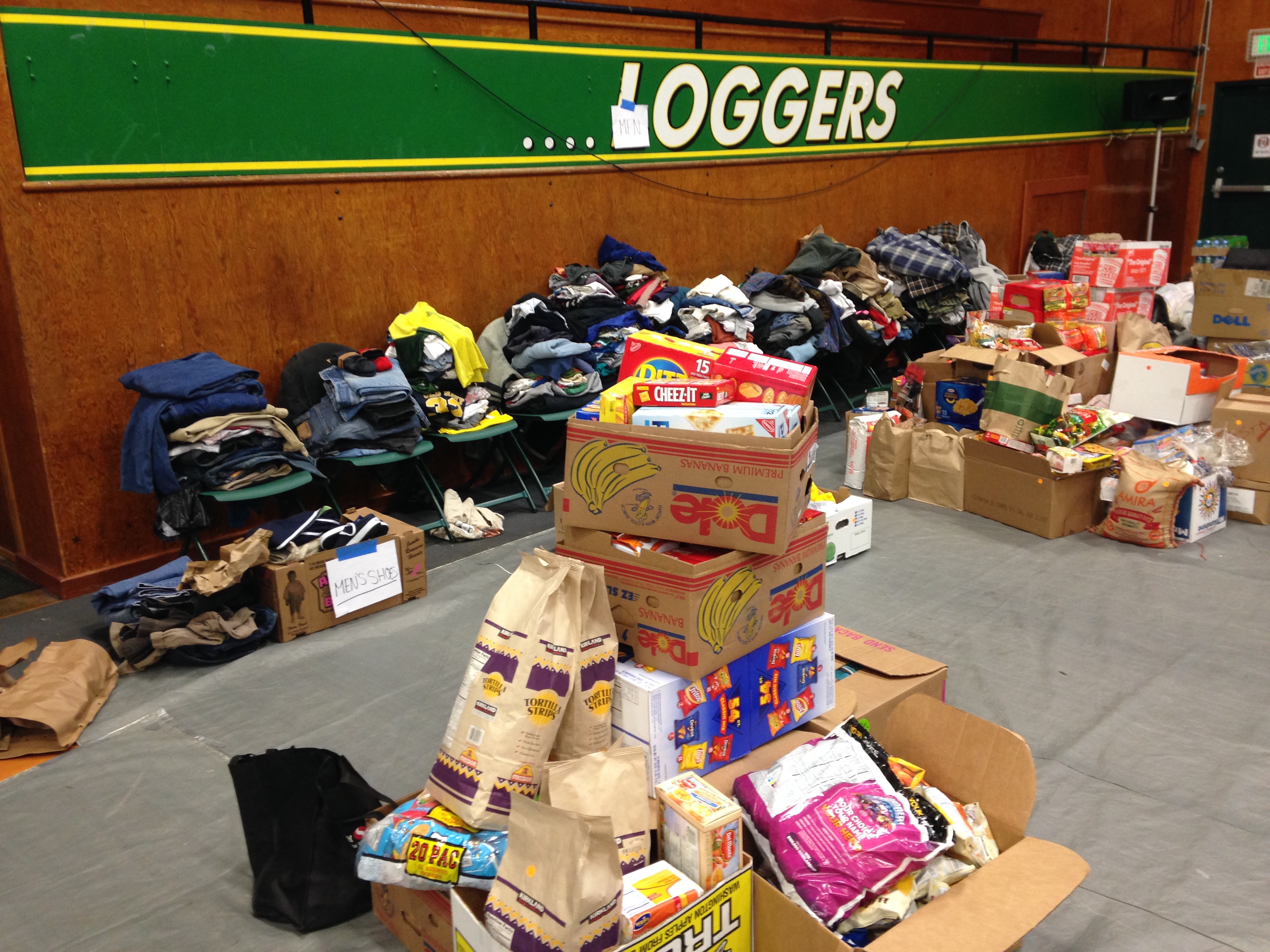 caption: Donations were sorted and stored at the Darrington High School gym on March 26, 2014. 