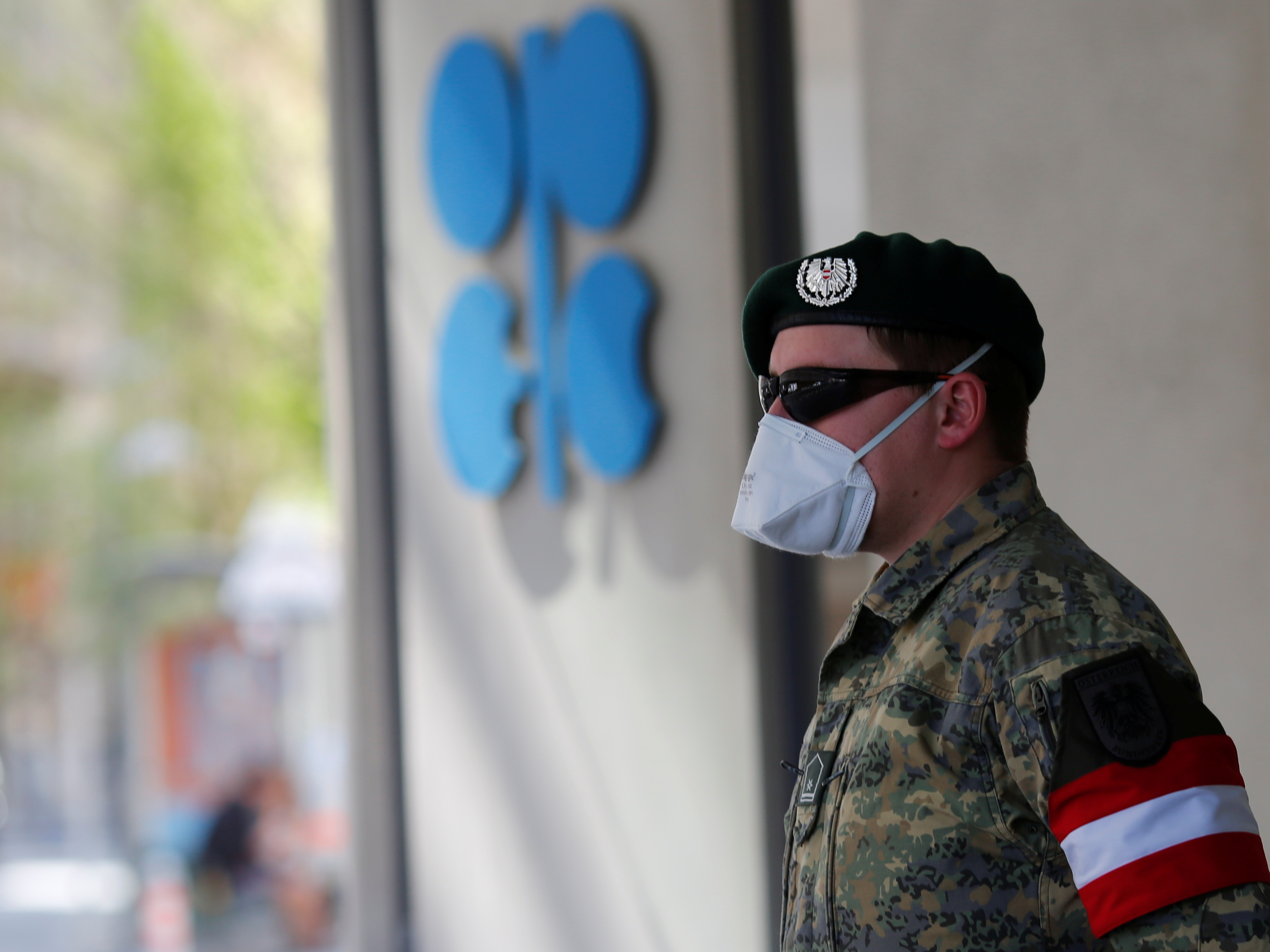 caption: An Austrian army member stands in front of OPEC's headquarters in Vienna on Thursday.