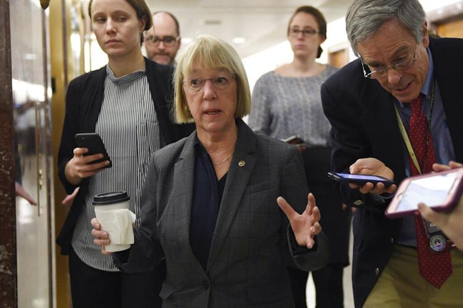 caption: Sen. Patty Murray, D-Wash., center, talks to reporters on Capitol Hill in Washington, Friday, Jan. 24, 2020, as she heads to a closed, all-senators briefing on the coronavirus.