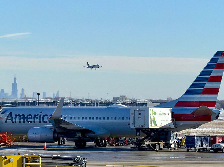 caption: American Airlines is one of two major airlines with hubs at O'Hare International Airport in Chicago.