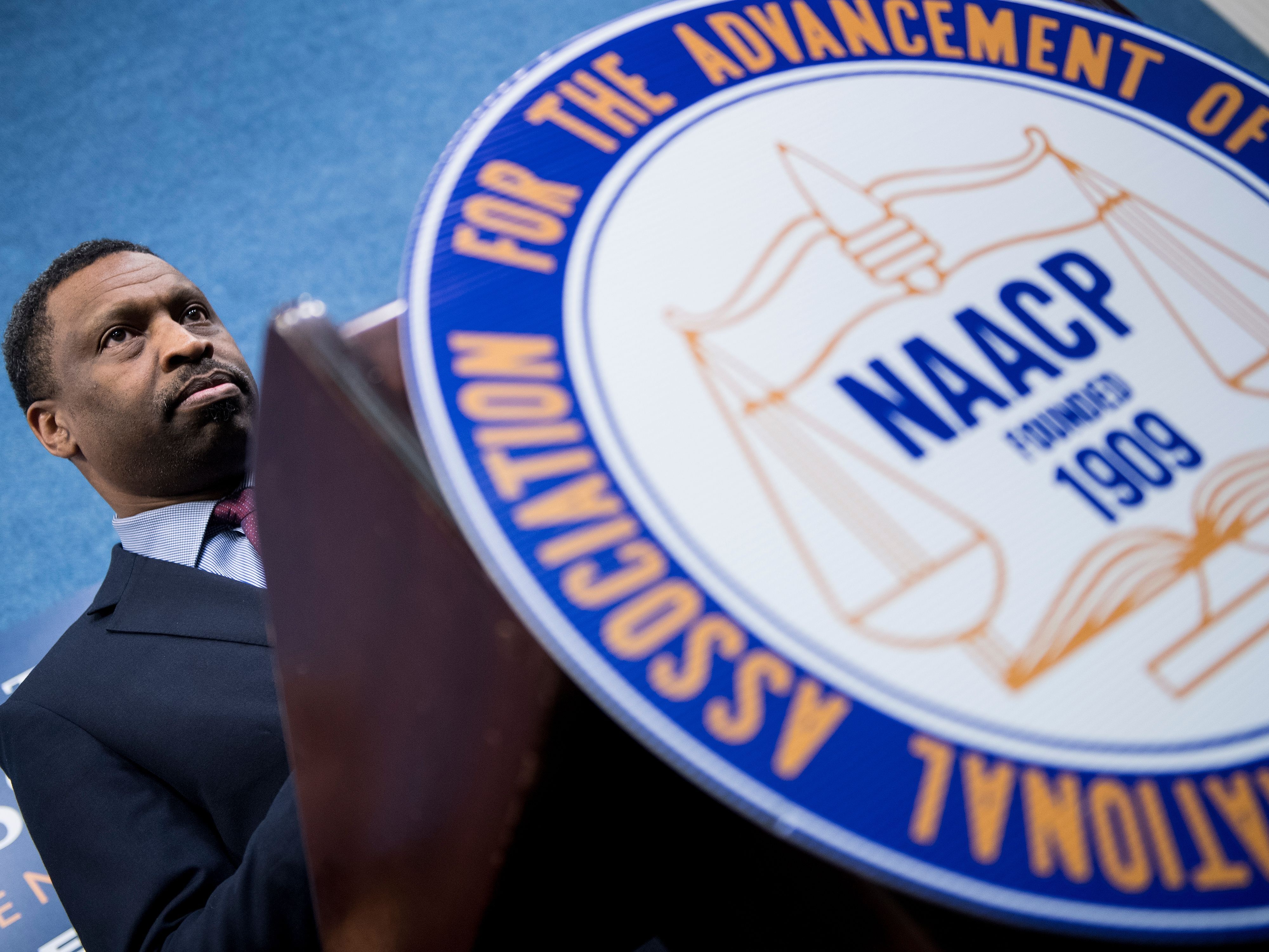 caption: Derrick Johnson, president and CEO of the NAACP, seen here in a 2019 photo, is expected to be one of the headlining speakers on the DNC’s main stage Monday night.