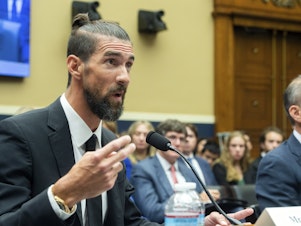 caption: Michael Phelps, the most decorated Olympic athlete of all time, testifies Tuesday on Capitol Hill during a Congressional hearing on Oversight and Investigations. Lawmakers discussed anti-doping measures ahead of this year's Paris Summer Olympics.