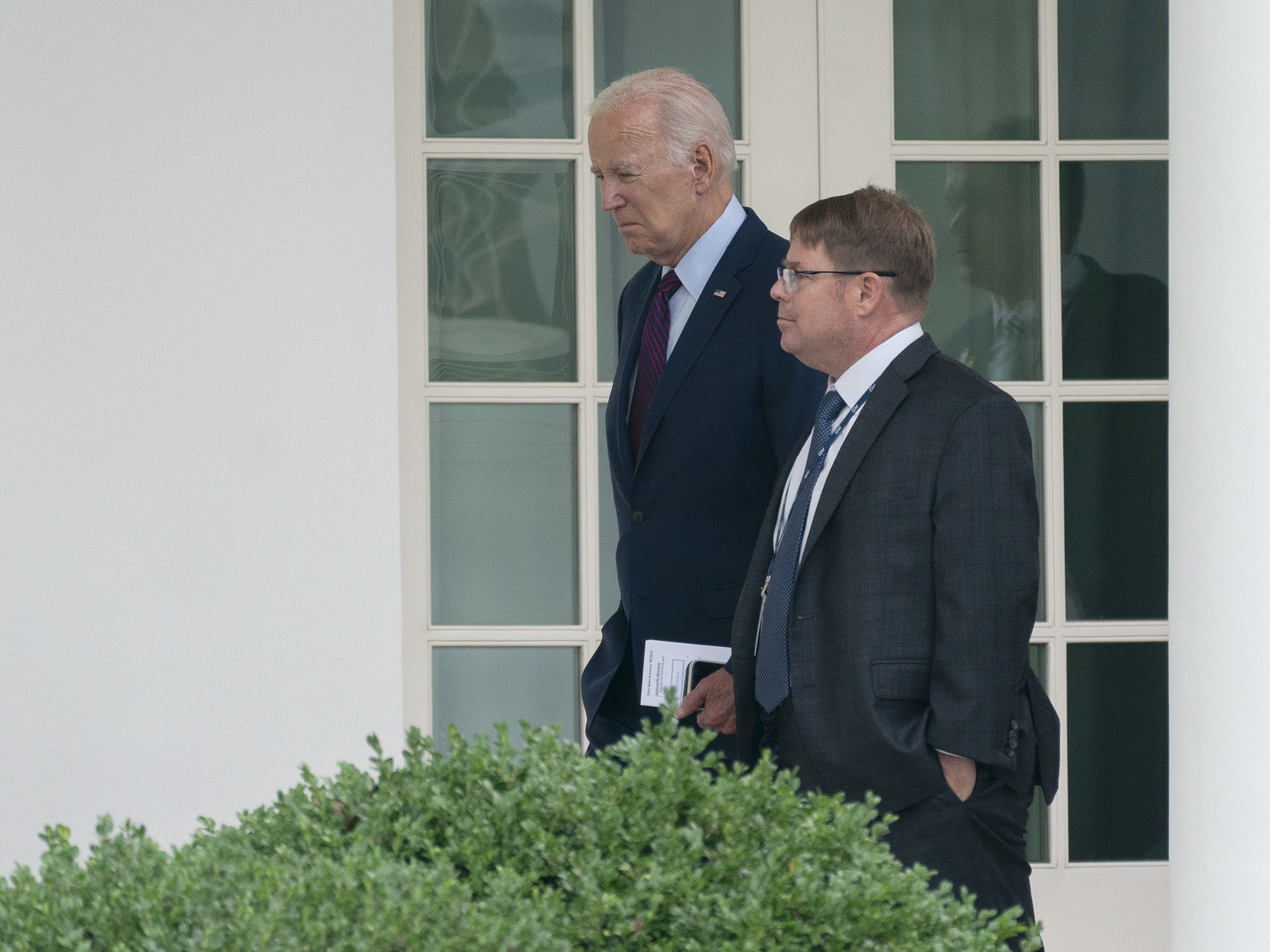 caption: Former President Joe Biden walks with his White House physician, Kevin O'Connor, outside the White House on Aug. 28, 2023. O'Connor declined to testify Wednesday as part of an investigation by Republicans on the House Oversight Committee into Biden's mental fitness.