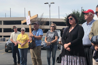 caption: A few dozen anti-abortion activists gathered outside the coroner's office in Will County, Ill., on Thursday, to pray and call for formal burial of the remains.