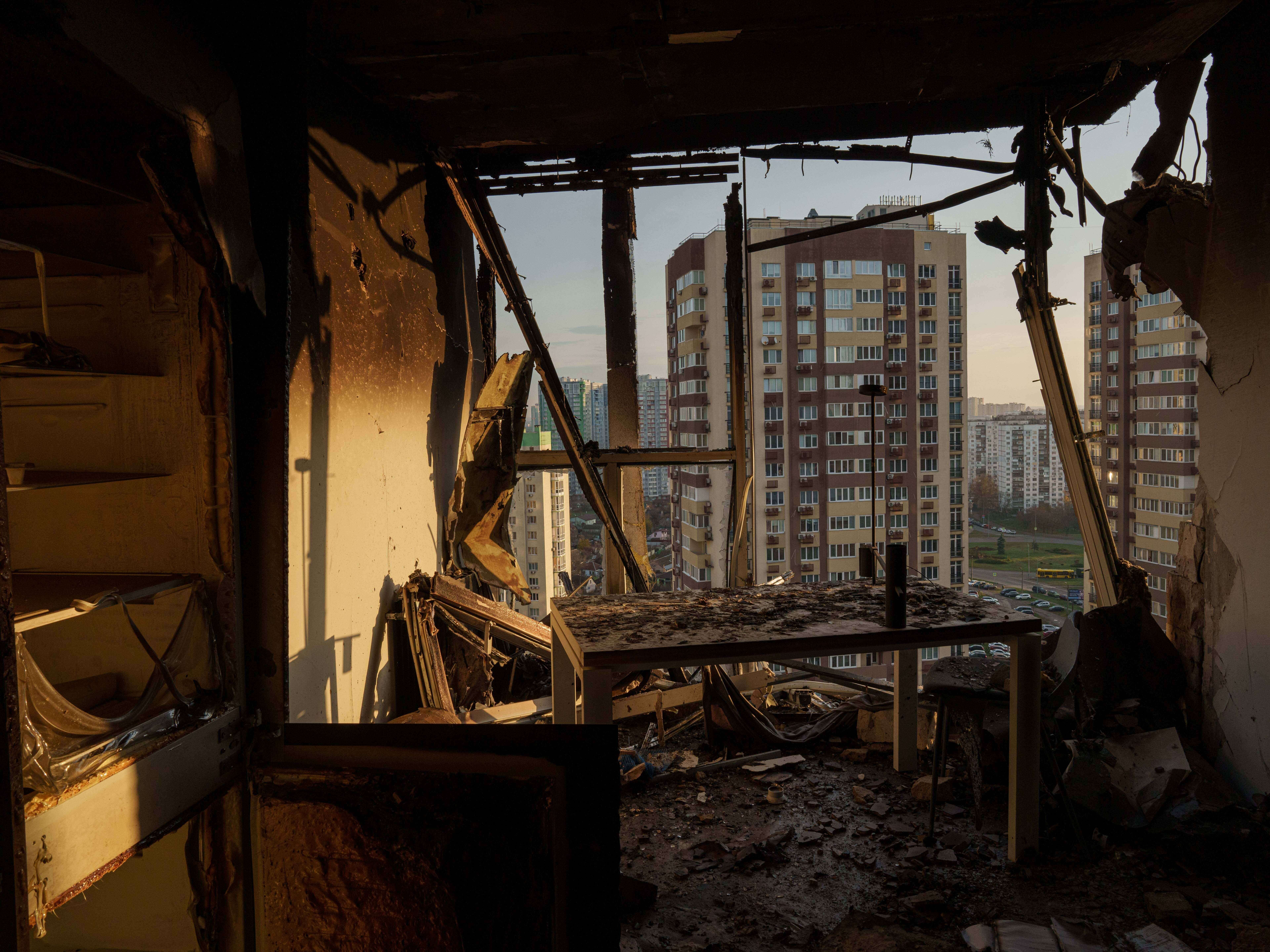 caption: An apartment is seen damaged after a Russian attack on residential neighbourhood in Kyiv, Ukraine, on Friday, Nov. 14, 2025.