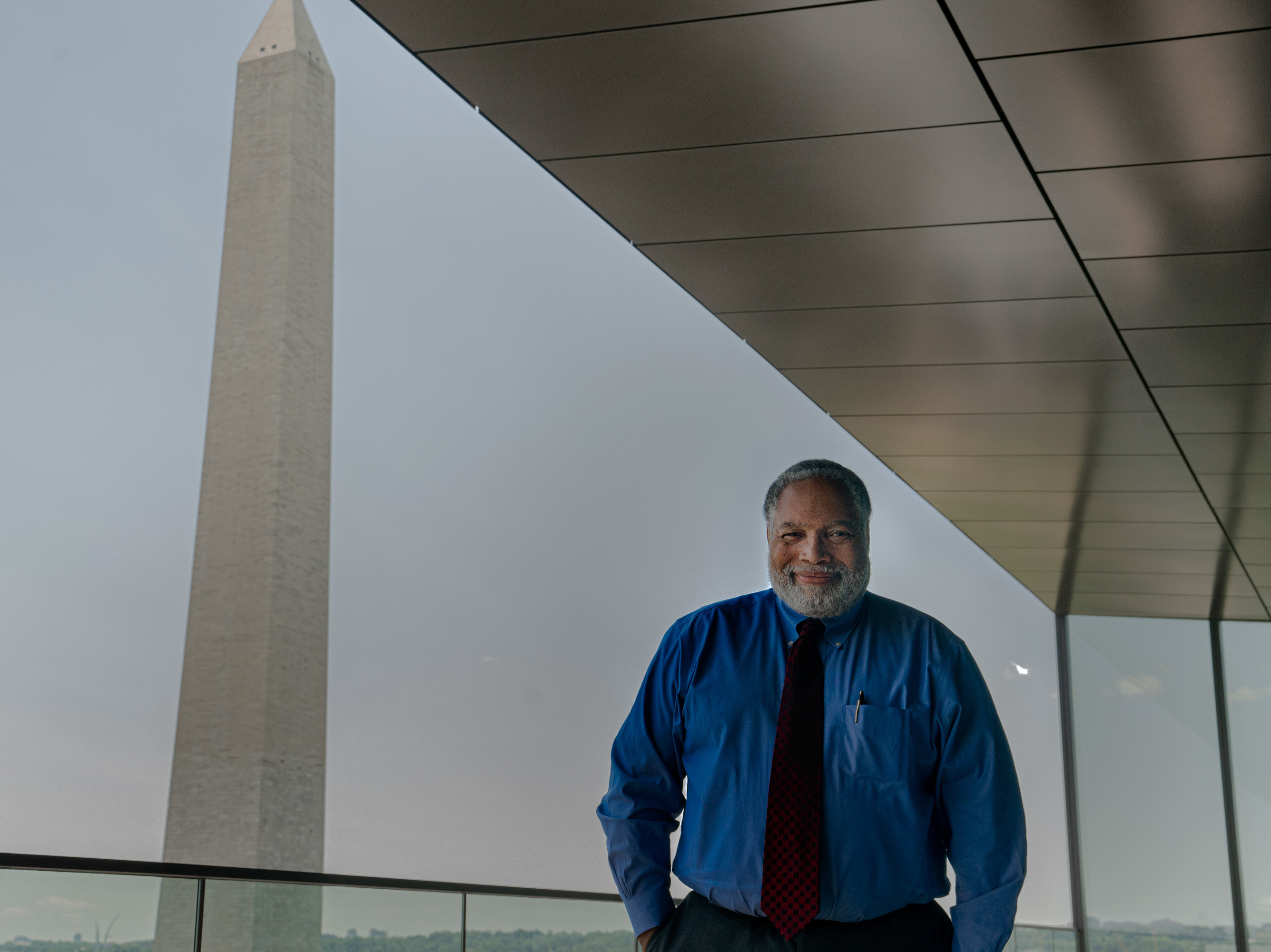 caption: Lonnie Bunch, the founding director of the National Museum of African American History and Culture, stands for a portrait at his office. He will soon become the Smithsonian Institution's new secretary.